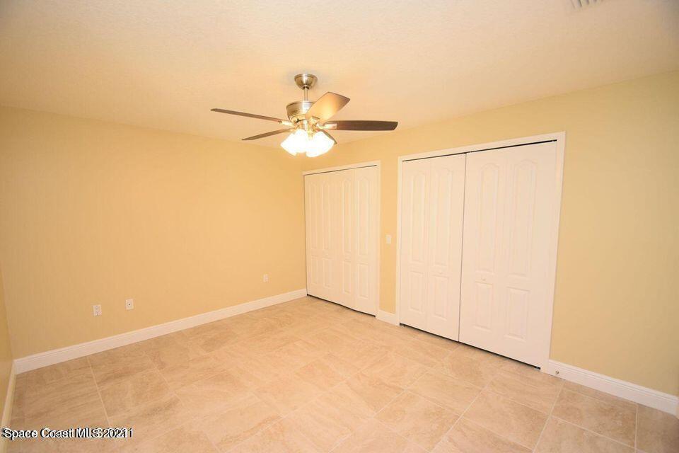 670 Cedar Side Circle Northeast Palm Bay, FL 32905 - Photo 19 of 22 a view of an empty room