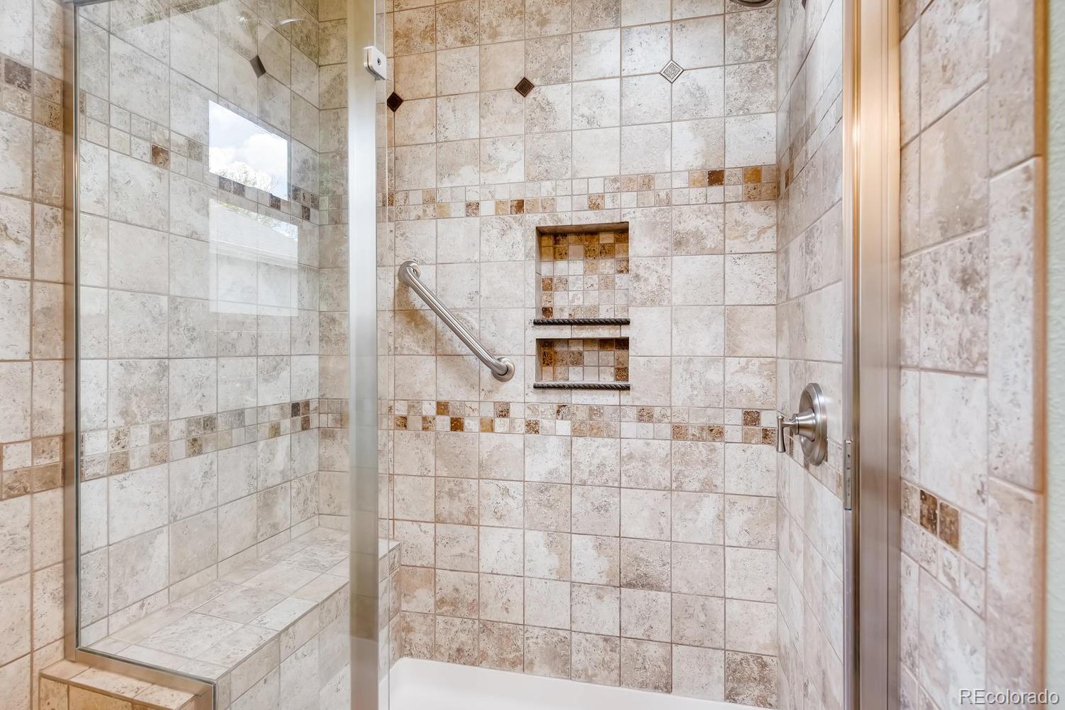 9840 South Castle Ridge Circle Highlands Ranch, CO 80129 - Photo 16 of 28 a bathroom with a shower