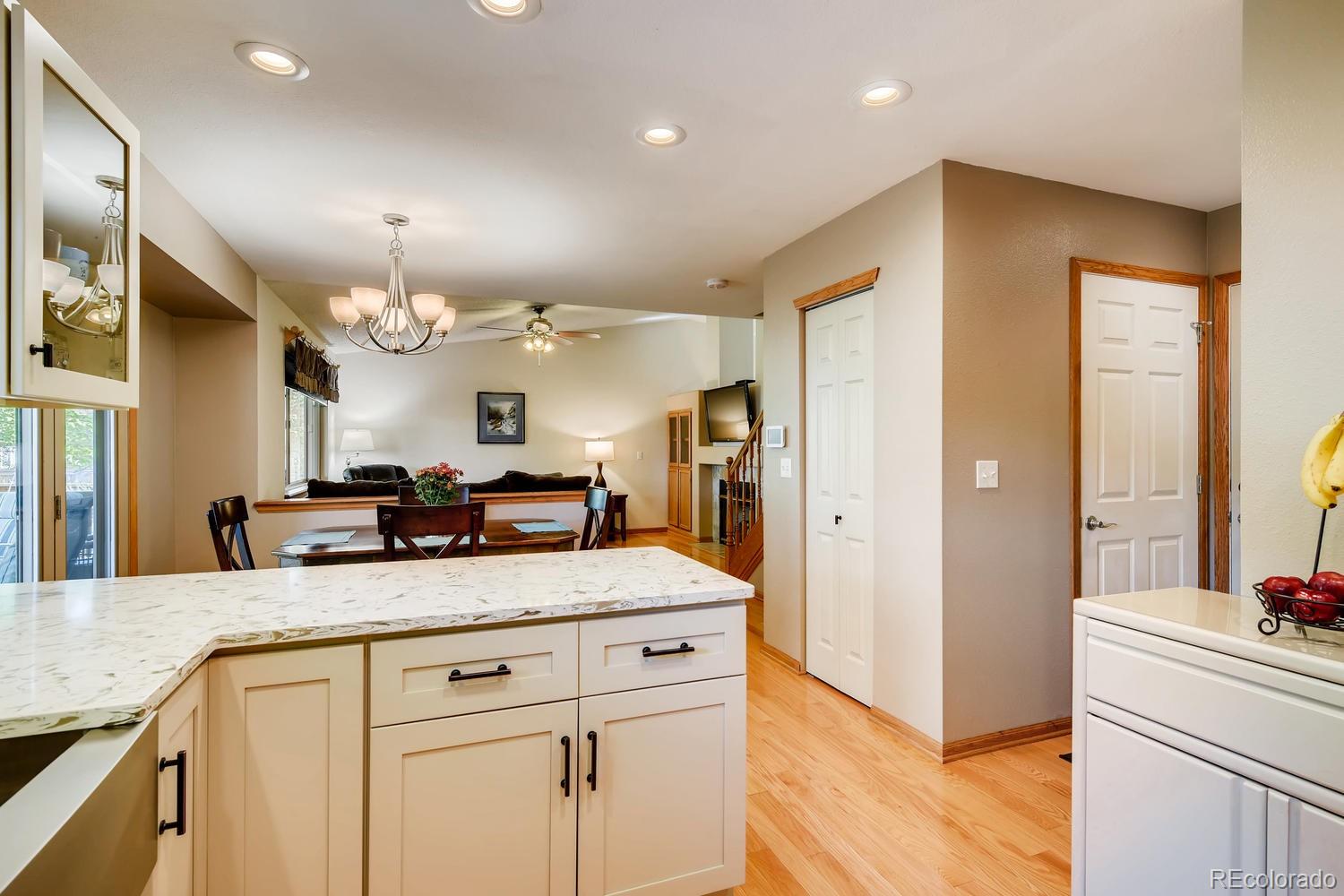 9840 South Castle Ridge Circle Highlands Ranch, CO 80129 - Photo 7 of 28 a view of a kitchen counter space and window