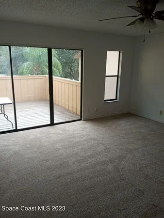 a view of a room with a window