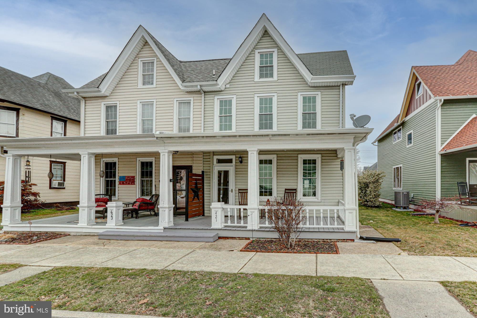 421 Main Street Clayton, DE 19938 - Photo 1 of 77 front view of a house with a porch