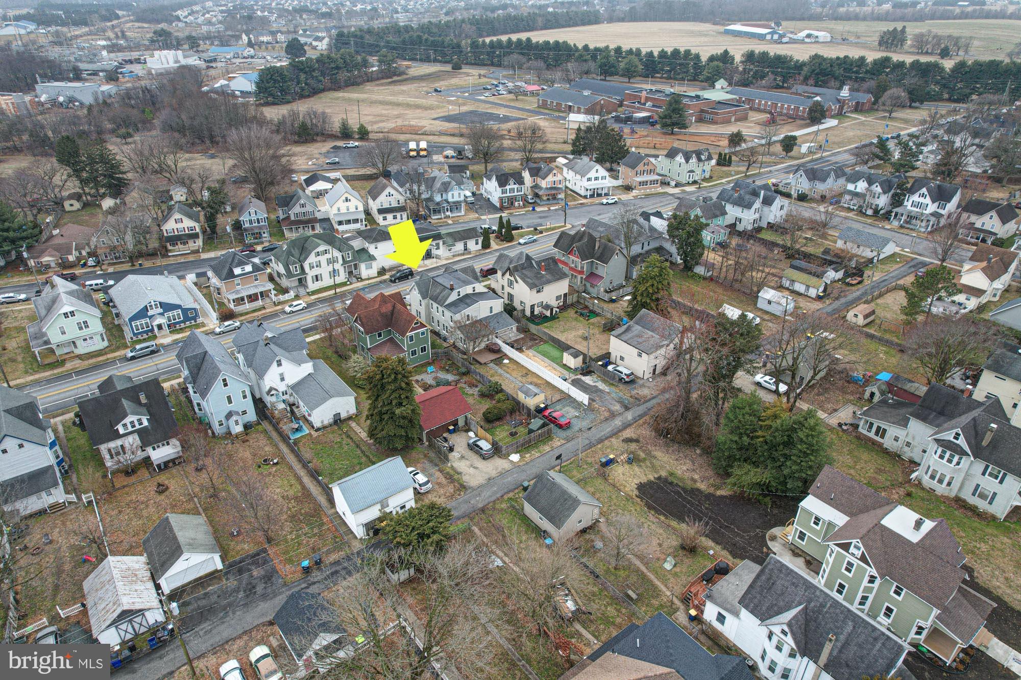 421 Main Street Clayton, DE 19938 - Photo 69 of 77 an aerial view of residential houses with outdoor space