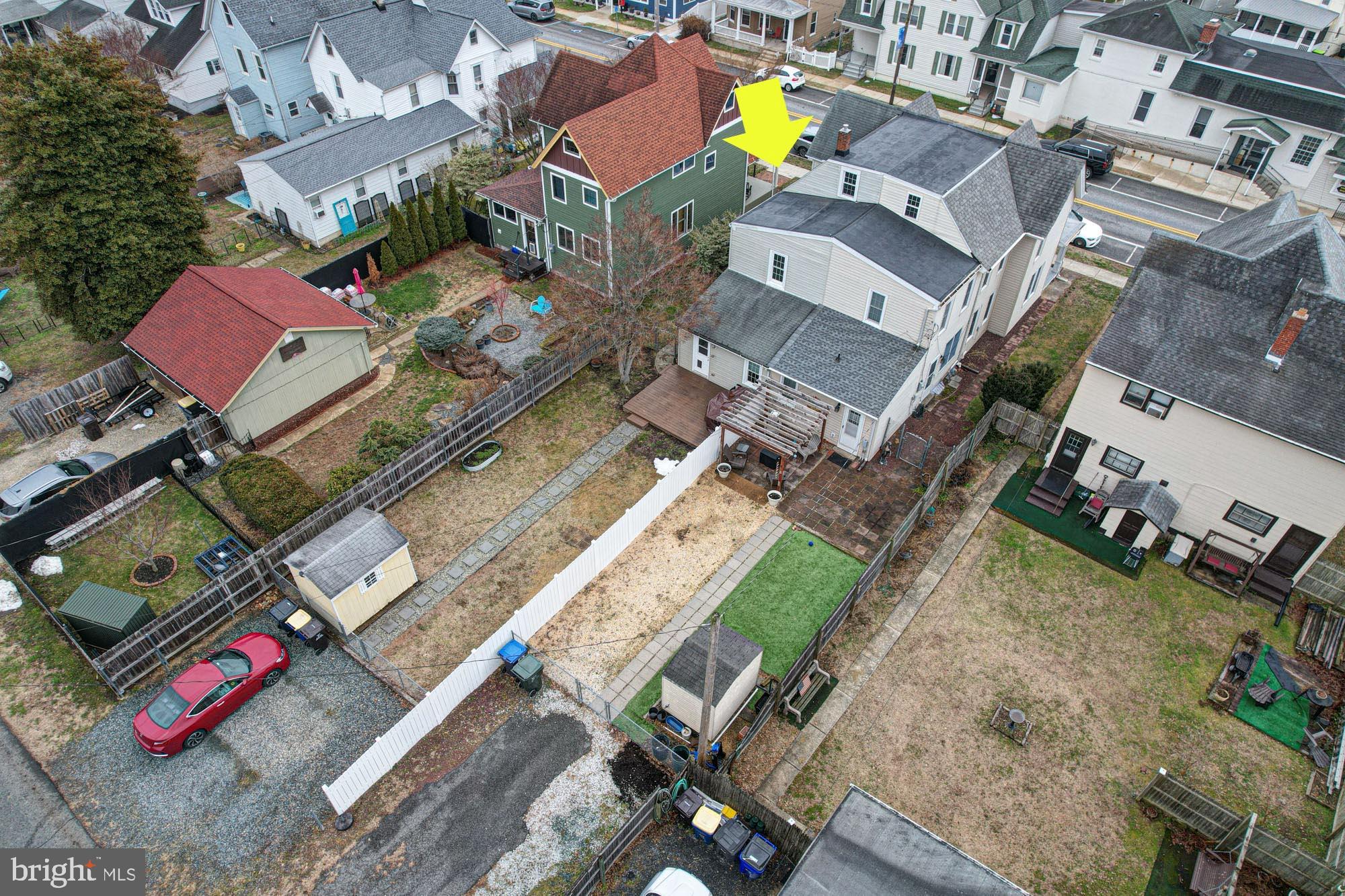 421 Main Street Clayton, DE 19938 - Photo 71 of 77 an aerial view of a house with a garden