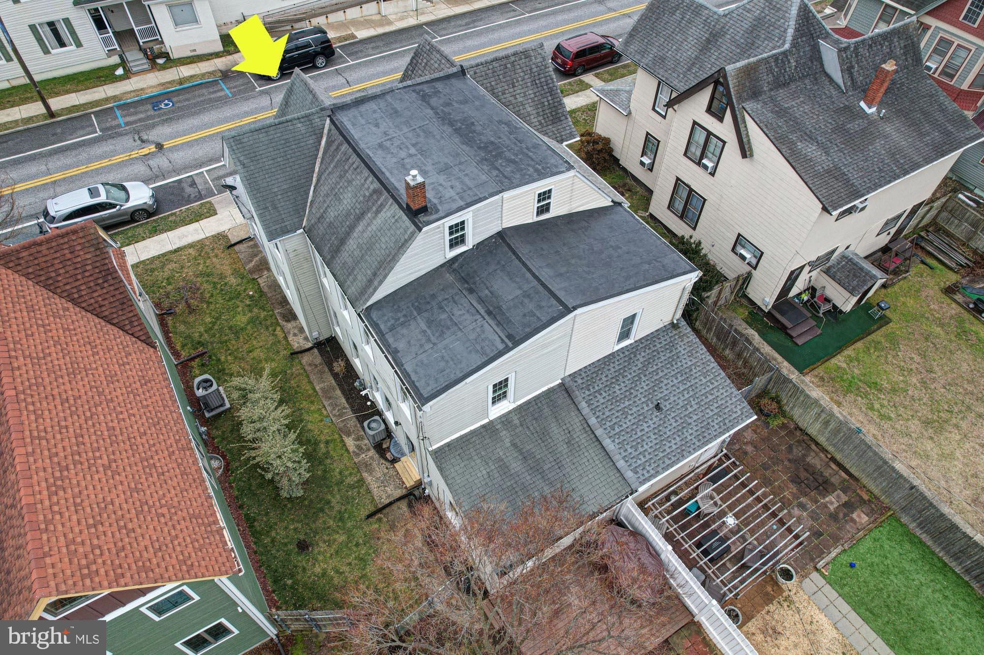 421 Main Street Clayton, DE 19938 - Photo 74 of 77 an aerial view of a house with backyard