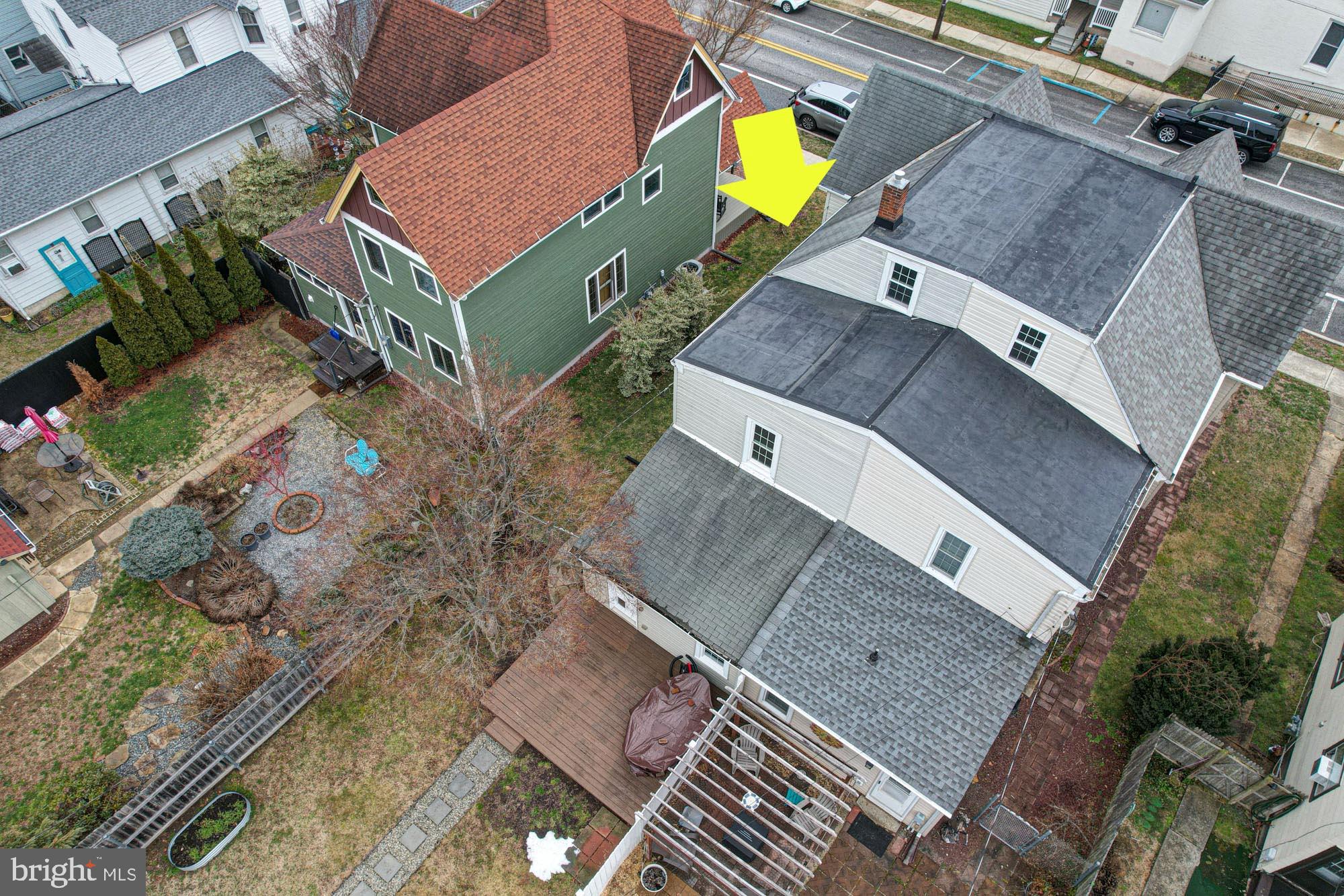 421 Main Street Clayton, DE 19938 - Photo 76 of 77 an aerial view of a house with a swimming pool