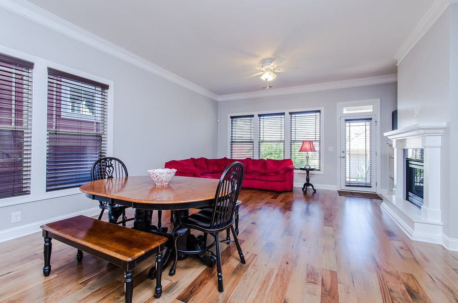 1407 Van Page Boulevard Raleigh, NC 27607 - Photo 11 of 25 Kitchen opens to the cozy family room that can accommodate a large eating area and seating area. Family Room