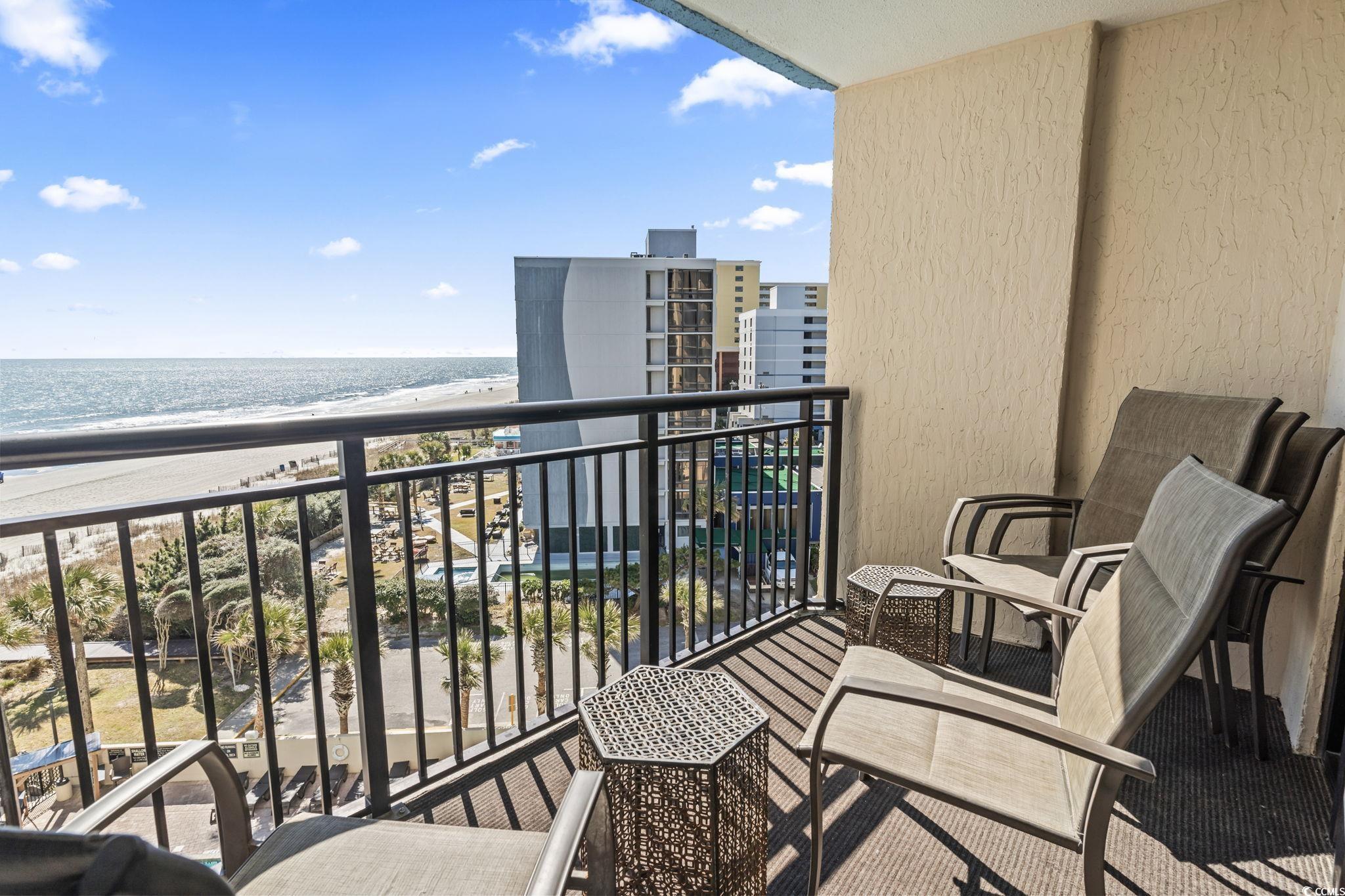 7100 North Ocean Boulevard, Unit 616 Myrtle Beach, SC 29572 - Photo 19 of 23 Balcony featuring view of water and beach