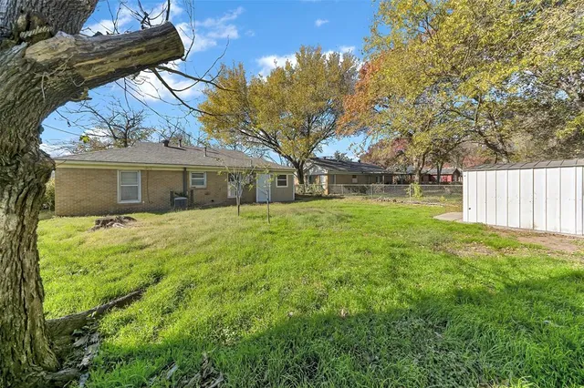 a house view with a garden space