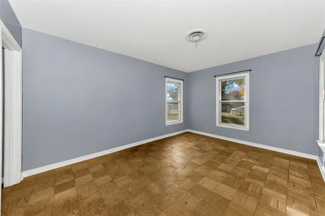 an empty room with windows