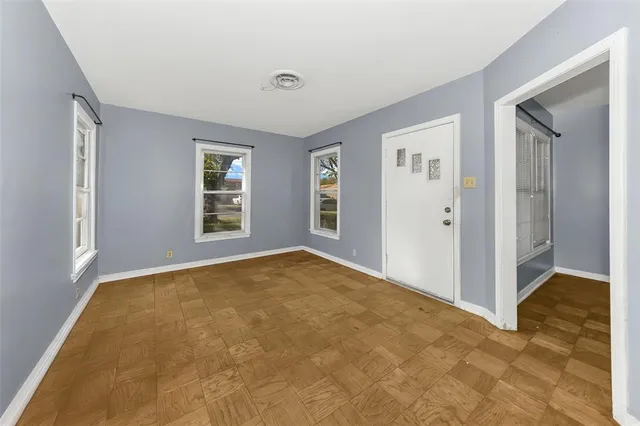 wooden floor and windows in a room