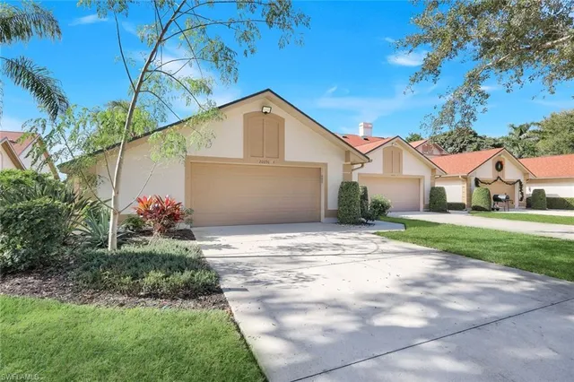 a view of garage and yard