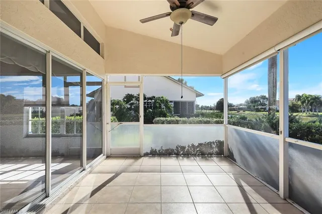 a bathroom with a tub and shower