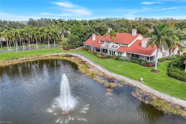 a view of a lake with a yard