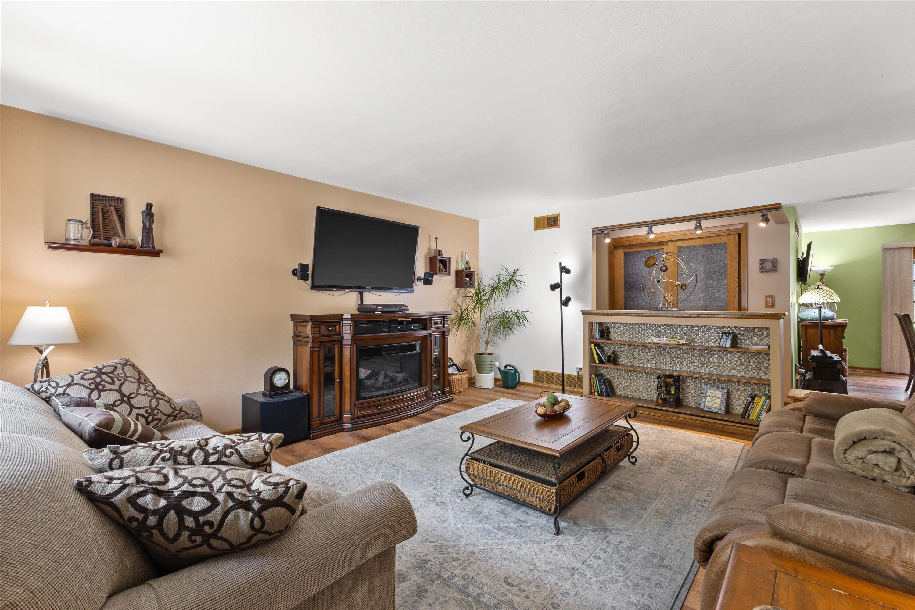 3732 South 75th Street Milwaukee, WI 53220 - Photo 6 of 43 Lower Living Room w/Built-in Bookcase