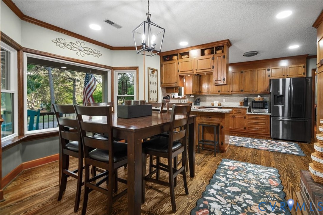 18522 Goode Lane Dinwiddie, VA 23841 - Photo 21 of 99 a view of a dining room with furniture window and outside view