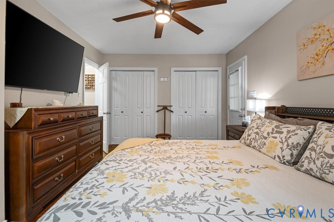 18522 Goode Lane Dinwiddie, VA 23841 - Photo 23 of 99 a bedroom with a bed and a flat screen tv
