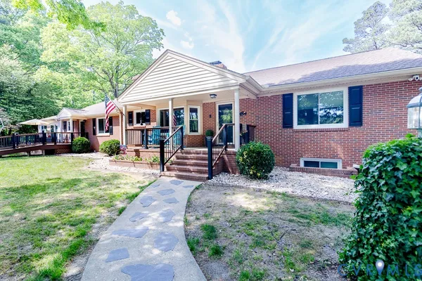 front view of a house with a yard