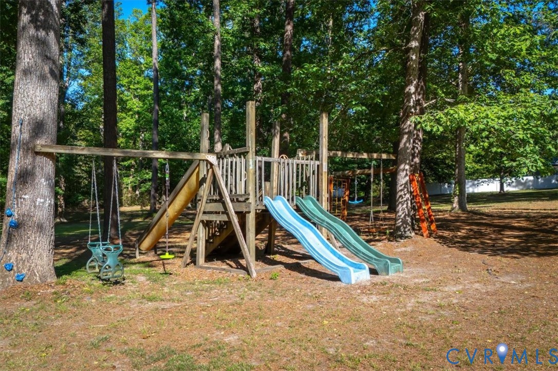 18522 Goode Lane Dinwiddie, VA 23841 - Photo 86 of 99 a view of a park with a wooden deck