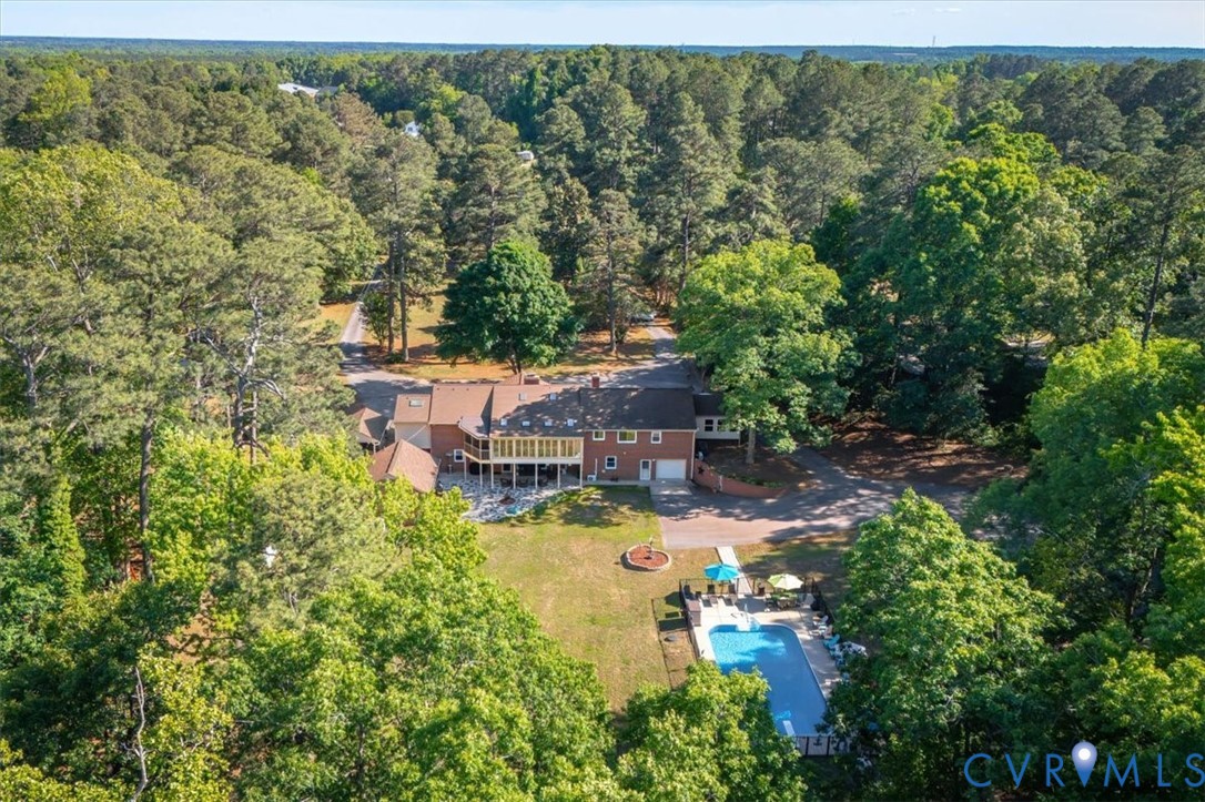 18522 Goode Lane Dinwiddie, VA 23841 - Photo 88 of 99 an aerial view of residential house with outdoor space and trees all around