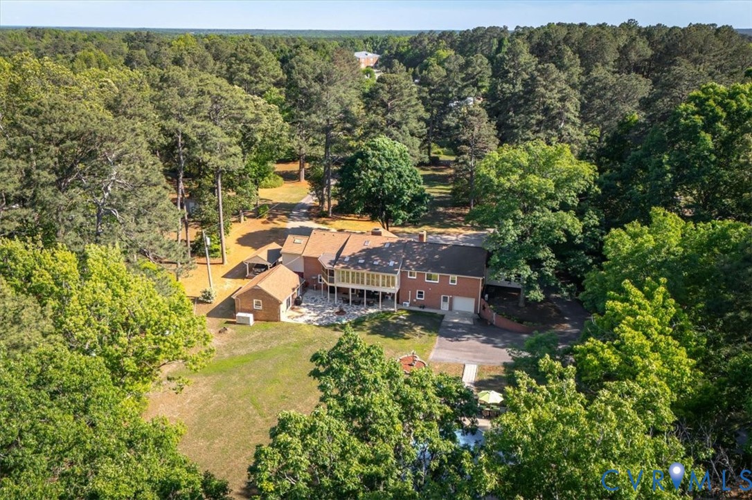 18522 Goode Lane Dinwiddie, VA 23841 - Photo 98 of 99 an aerial view of a house with a yard basket ball court and outdoor seating