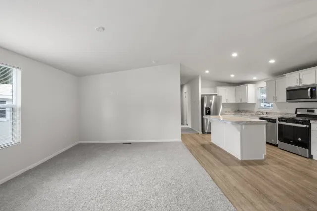 a view of kitchen with wooden floor