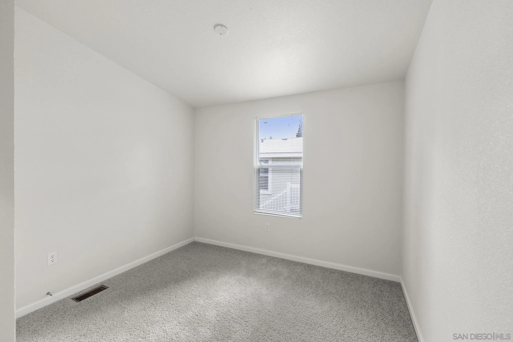 22899 Byron Road, Unit SPC 78 Crestline, CA 92325 - Photo 15 of 28 an empty room with a window