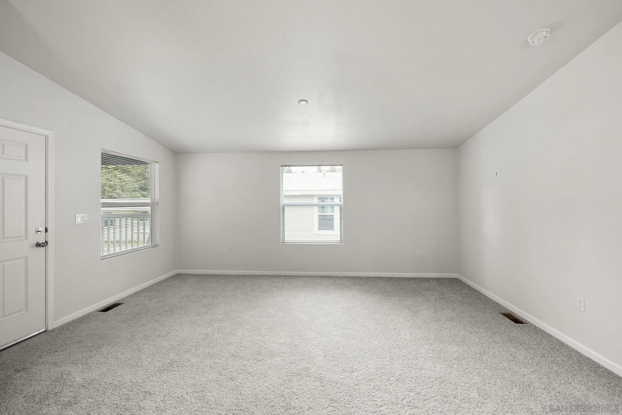 22899 Byron Road, Unit SPC 78 Crestline, CA 92325 - Photo 16 of 28 an empty room with a window