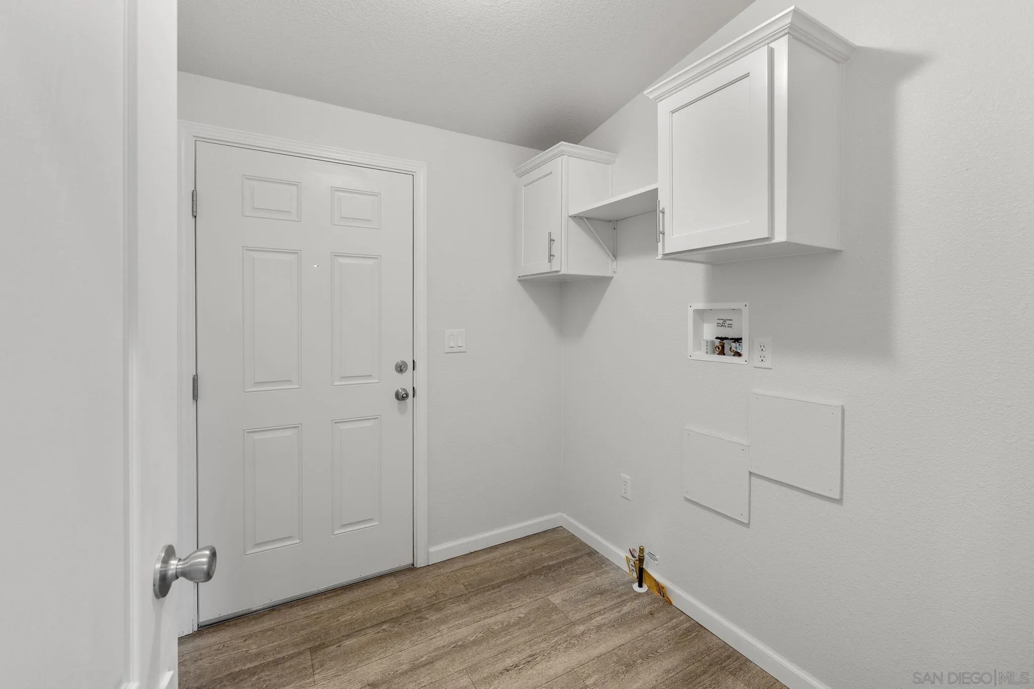 22899 Byron Road, Unit SPC 78 Crestline, CA 92325 - Photo 17 of 28 a view of cabinets and wooden floor