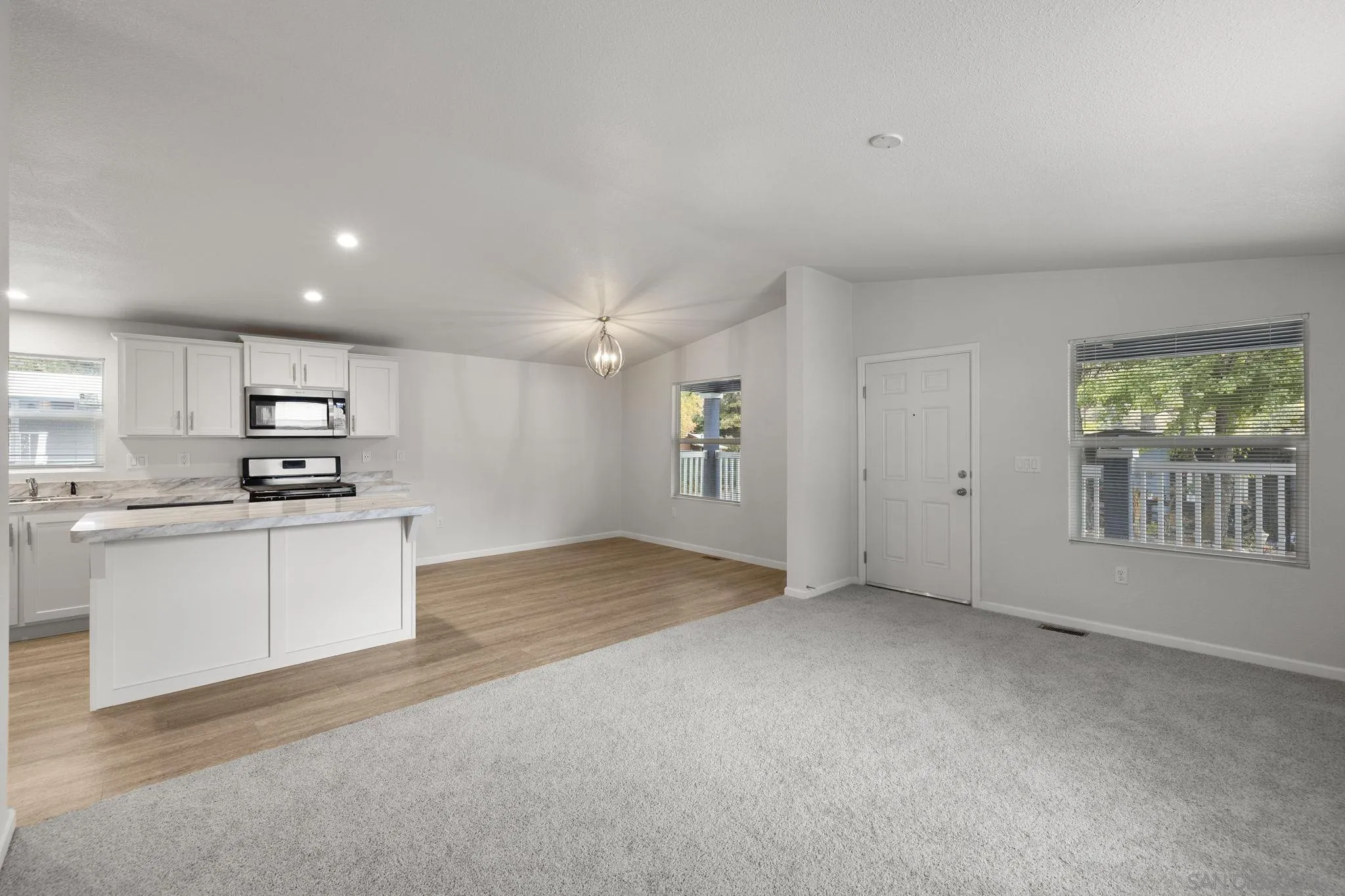 22899 Byron Road, Unit SPC 78 Crestline, CA 92325 - Photo 8 of 28 a view of kitchen with wooden floor and electronic appliances