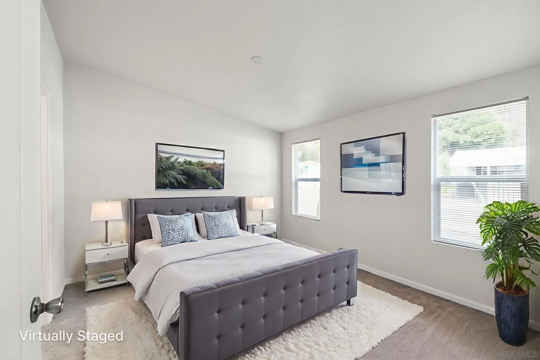 22899 Byron Road, Unit SPC 78 Crestline, CA 92325 - Photo 10 of 28 a bedroom with a large bed and a potted plant