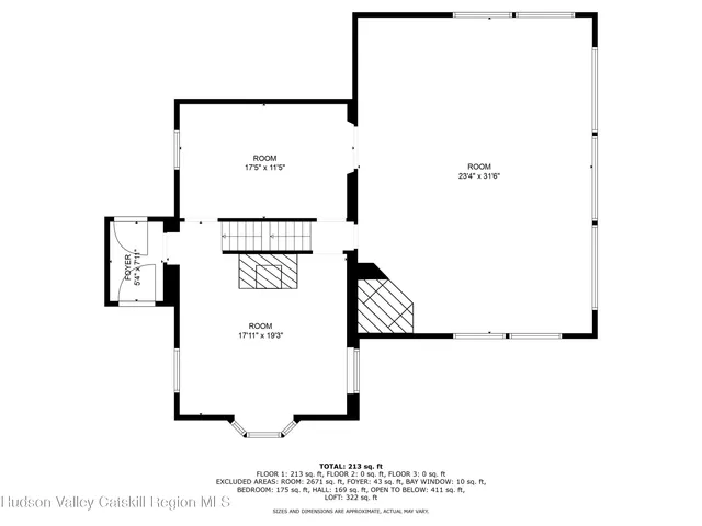 a black and white photo of a living room