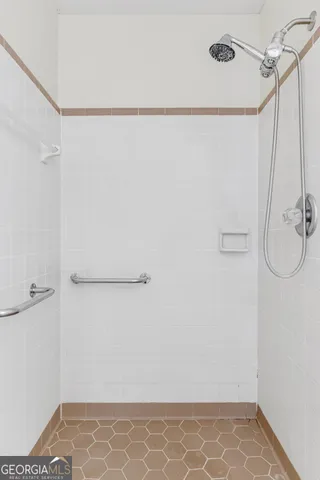 a view of livingroom with washer and dryer