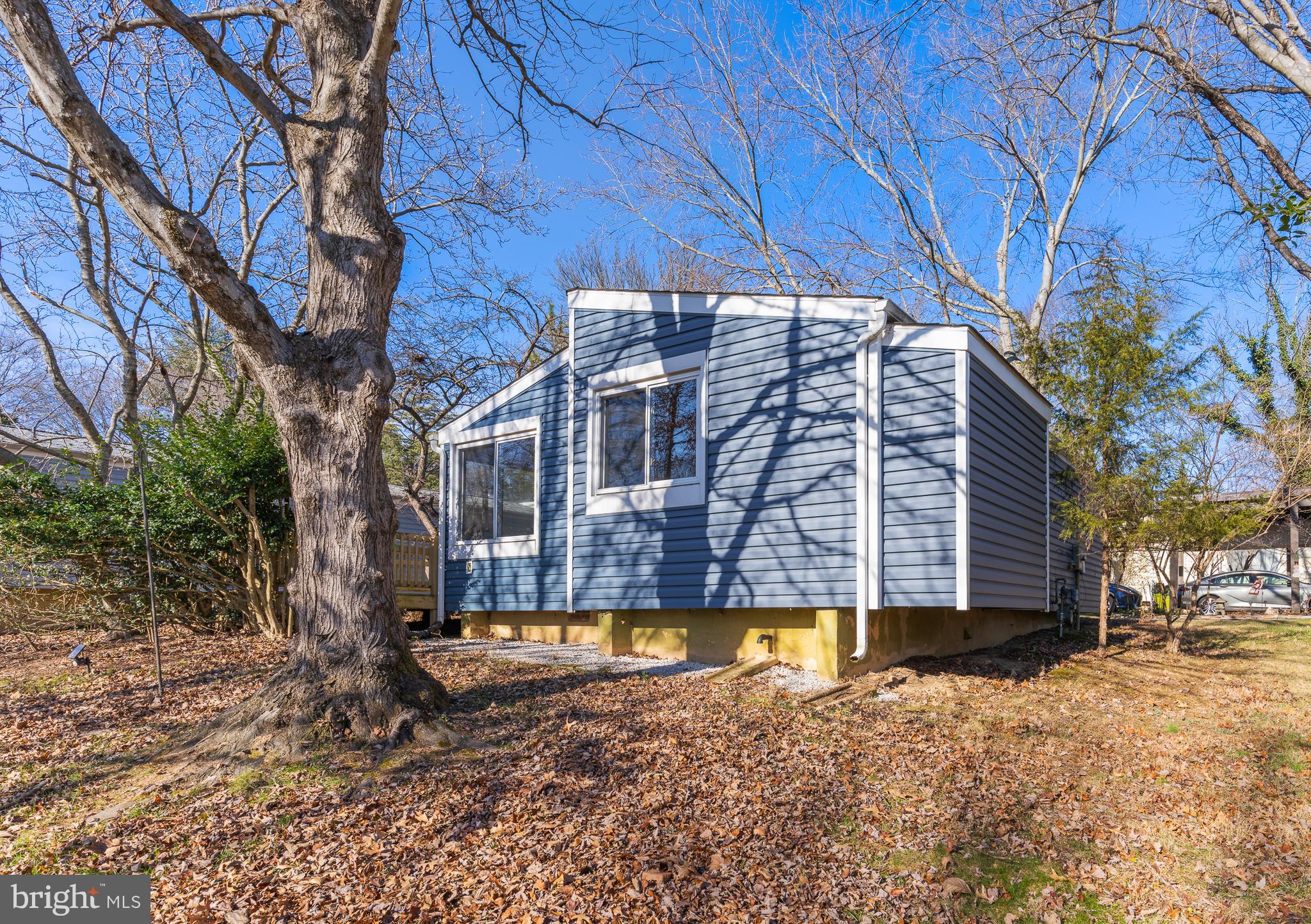 6145 Sinbad Place Columbia, MD 21045 - Photo 22 of 23 a view of a house with swimming pool
