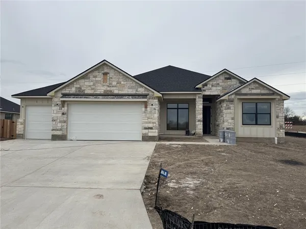 front view of a house with yard