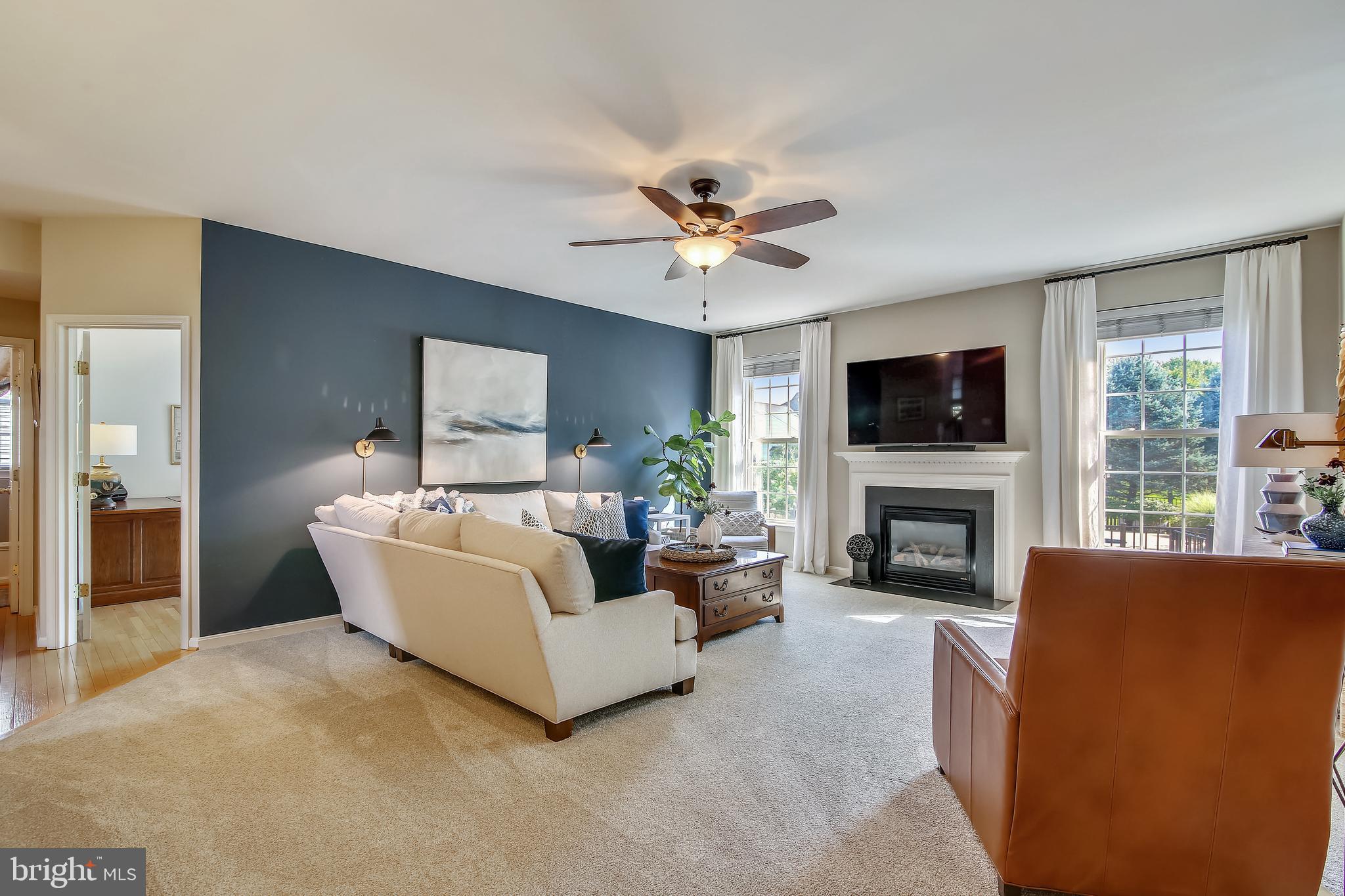 2807 Decatur Drive Adamstown, MD 21710 - Photo 8 of 59 Family room with gas fireplace, overlooks pool