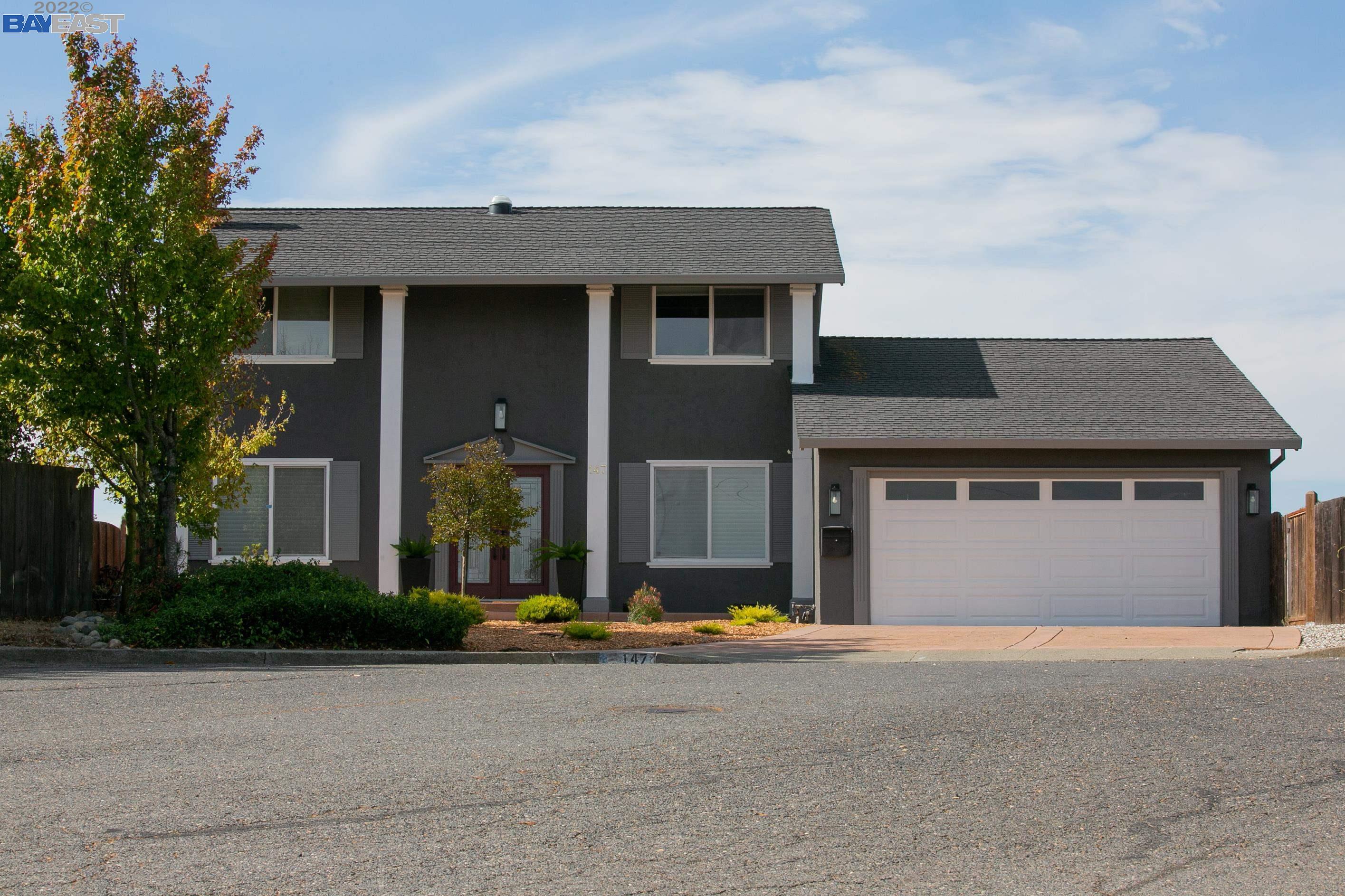 147 Ardmore Way Benicia, CA 94510 - Photo 1 of 1 a front view of a house with a yard