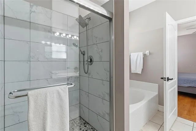 an aerial view of residential house with outdoor space and swimming pool