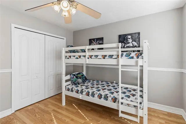 an outdoor sitting area with swimming pool and furniture