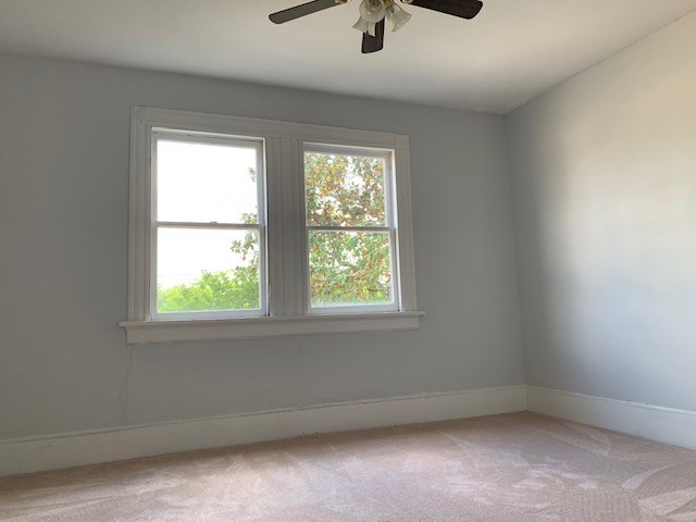 1217 17th Street Columbus, GA 31901 - Photo 15 of 20 an empty room with a window