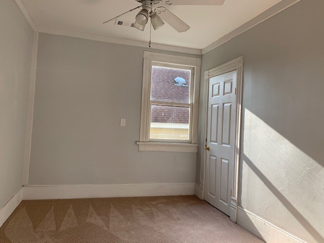 1217 17th Street Columbus, GA 31901 - Photo 17 of 20 a view of an empty room with a window