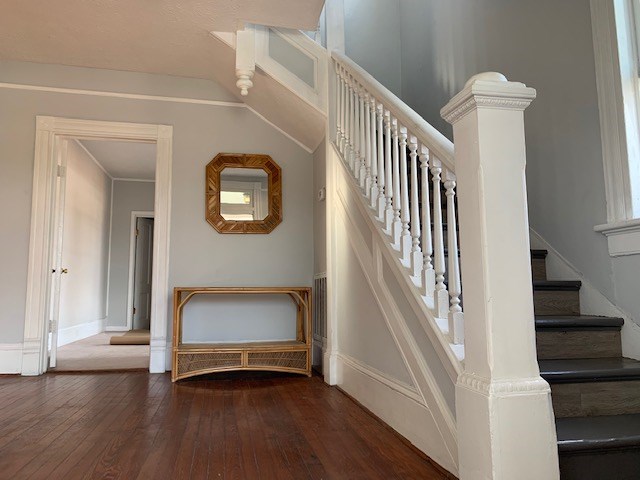 1217 17th Street Columbus, GA 31901 - Photo 3 of 20 a view of an entryway with wooden floor and door