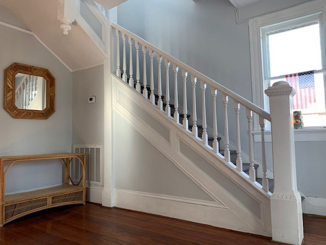 1217 17th Street Columbus, GA 31901 - Photo 4 of 20 a view of entryway with stairs and wooden floor