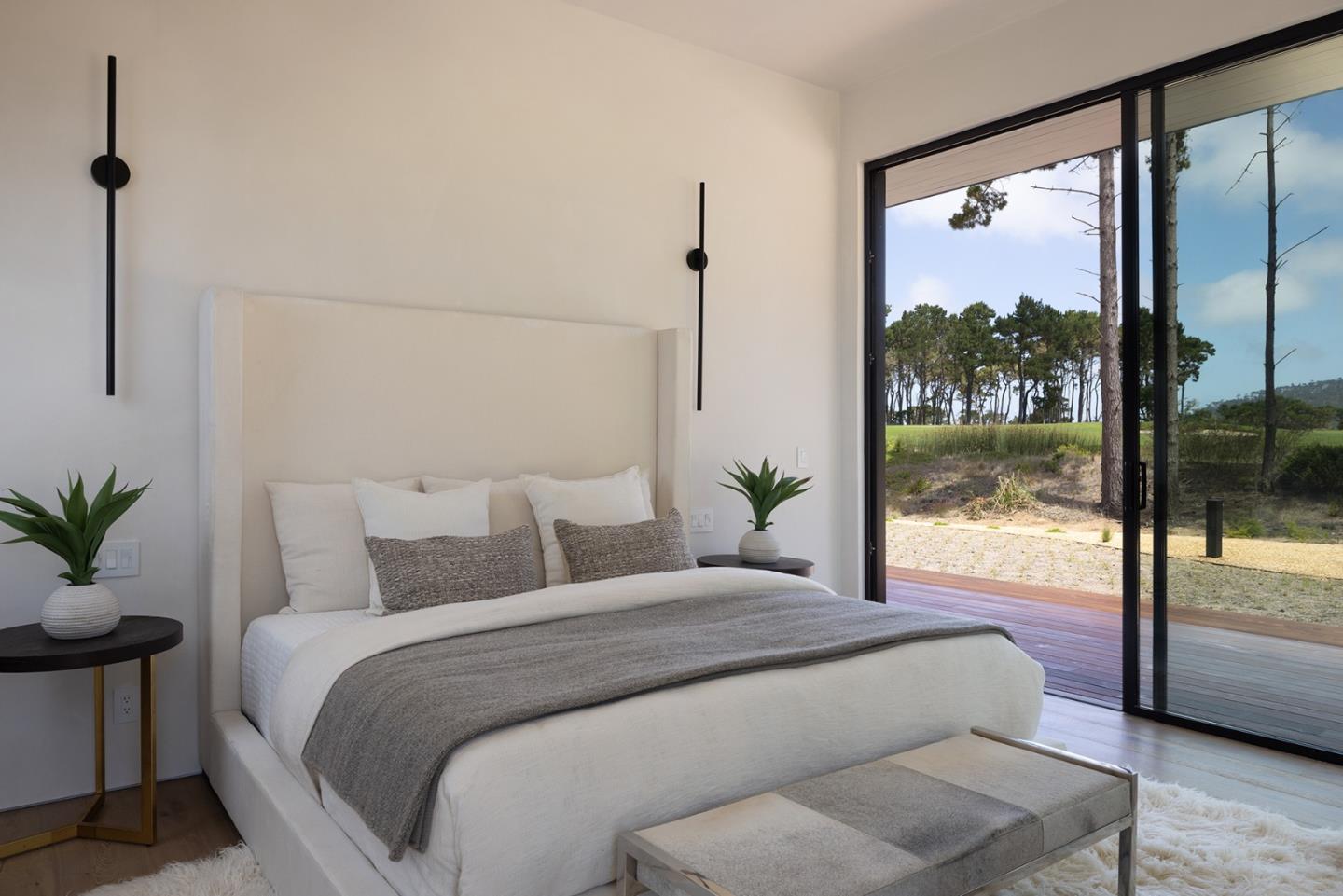 31 Poppy Lane Pebble Beach, CA 93953 - Photo 30 of 51 a bedroom with a large bed and a window