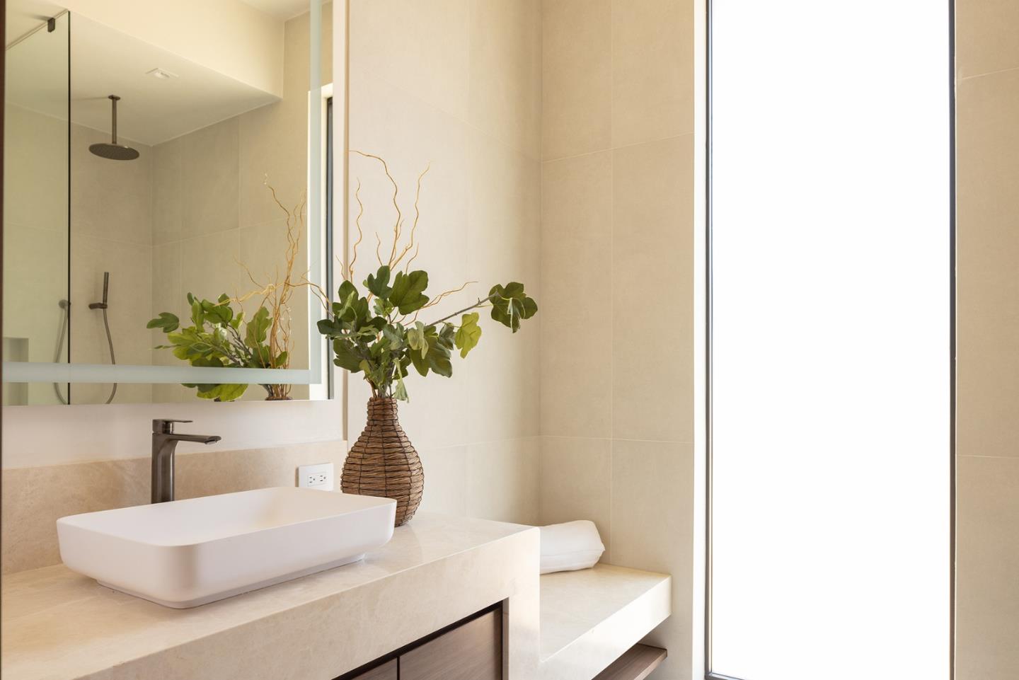 31 Poppy Lane Pebble Beach, CA 93953 - Photo 33 of 51 a bath room with a sink