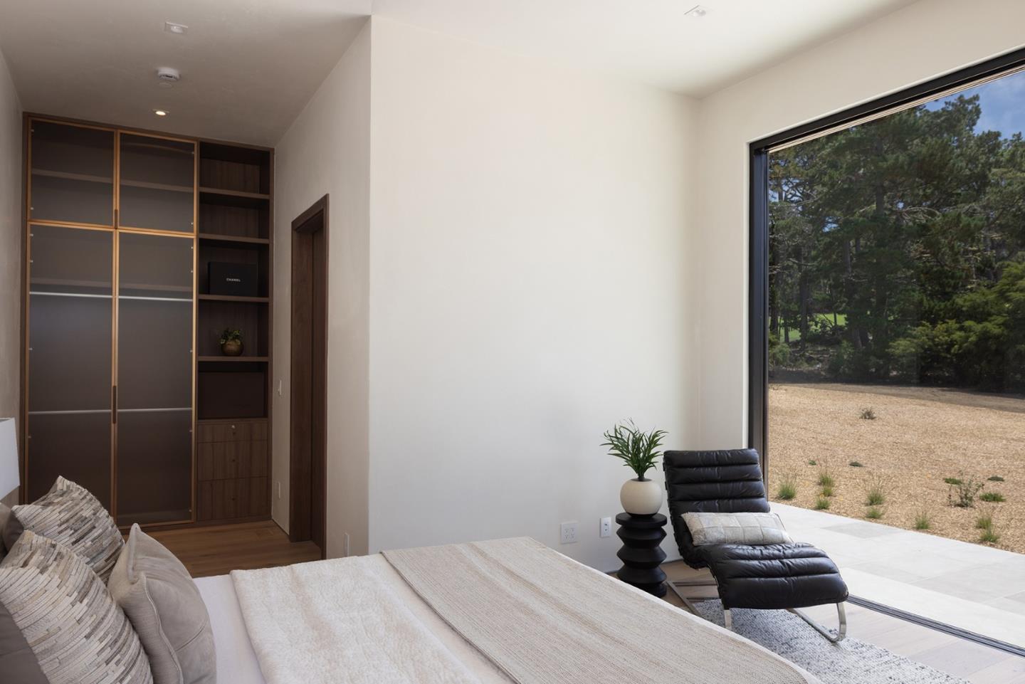 31 Poppy Lane Pebble Beach, CA 93953 - Photo 37 of 51 a bedroom with a bed and a window