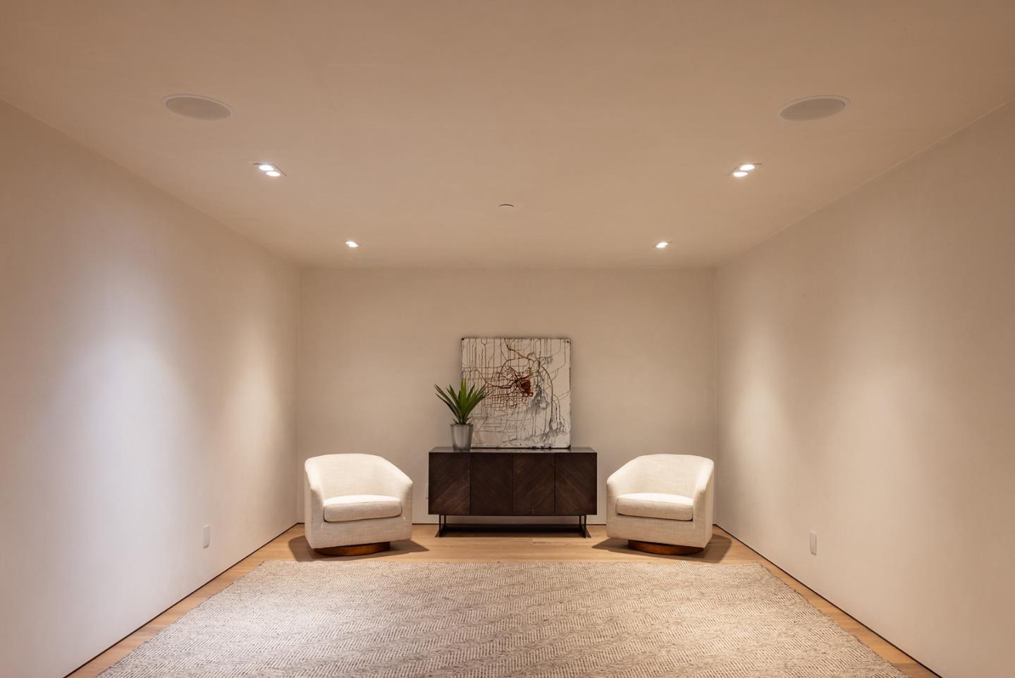 31 Poppy Lane Pebble Beach, CA 93953 - Photo 44 of 51 a bathroom with a toilet a sink a mirror and vanity