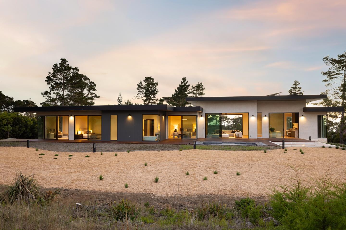 31 Poppy Lane Pebble Beach, CA 93953 - Photo 46 of 51 a front view of a house with a yard