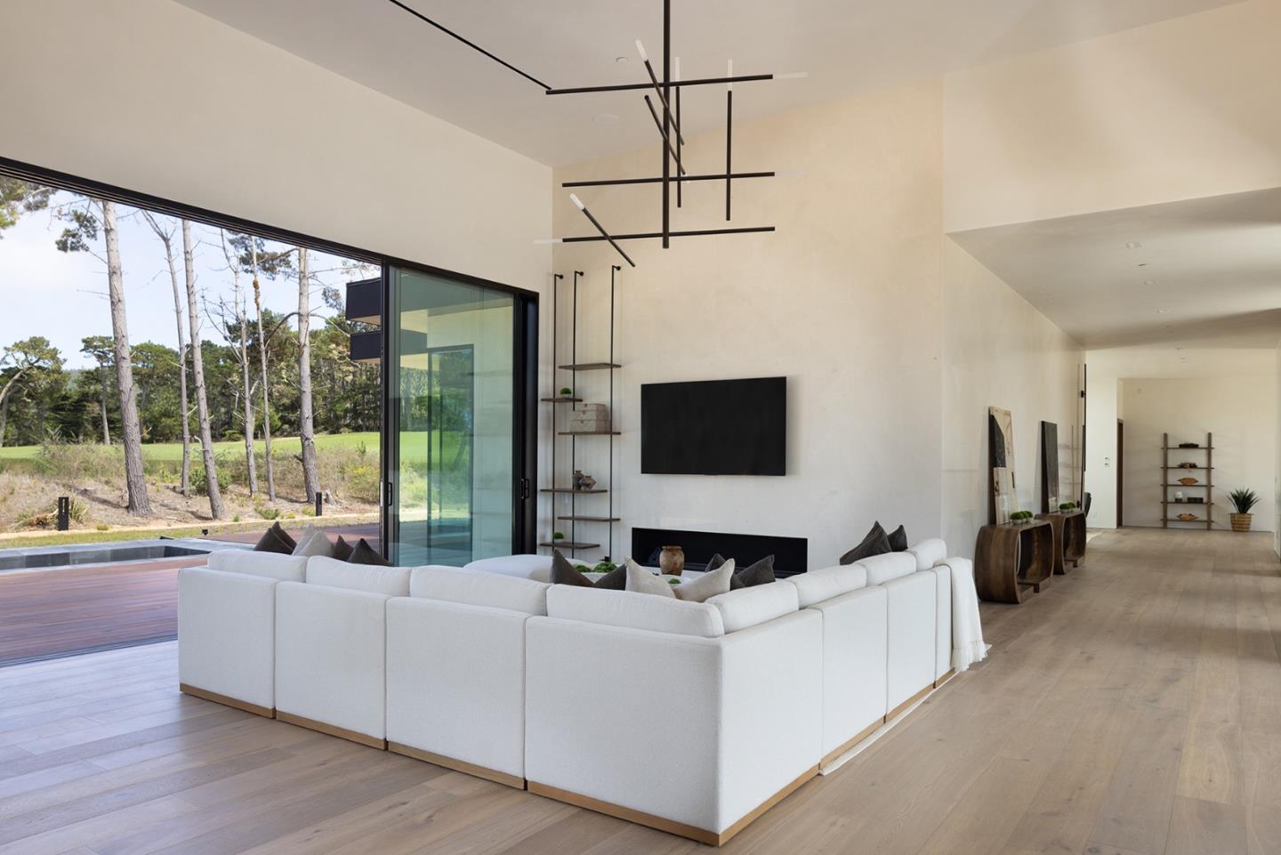 31 Poppy Lane Pebble Beach, CA 93953 - Photo 7 of 51 a living room with furniture and a flat screen tv