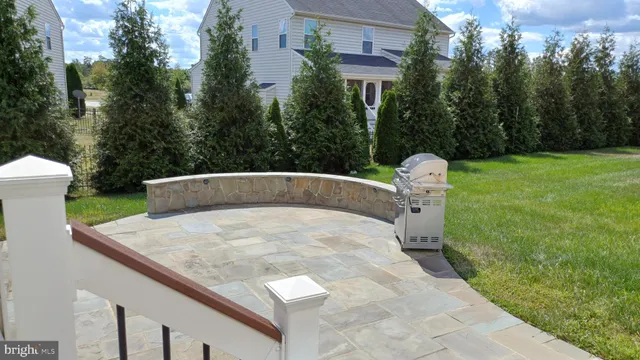 a bedroom with a bed and a desk