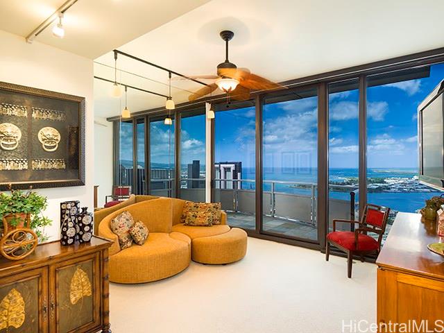 600 Queen Street, Unit 4201 Honolulu, HI 96813 - Photo 1 of 1 a bedroom with furniture and large windows
